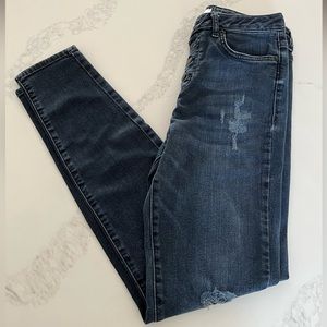 Dark blue forever 21 jeans. Slightly Ripped throughout. Button closure. Size 28.